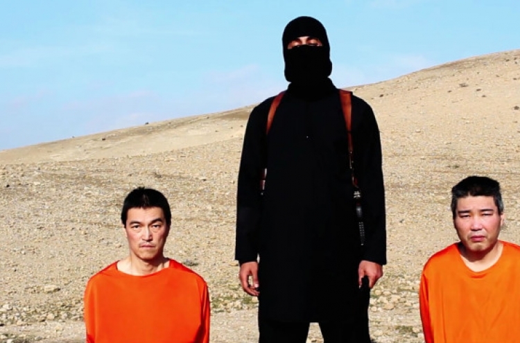 IS threatens to kill Japanese hostages