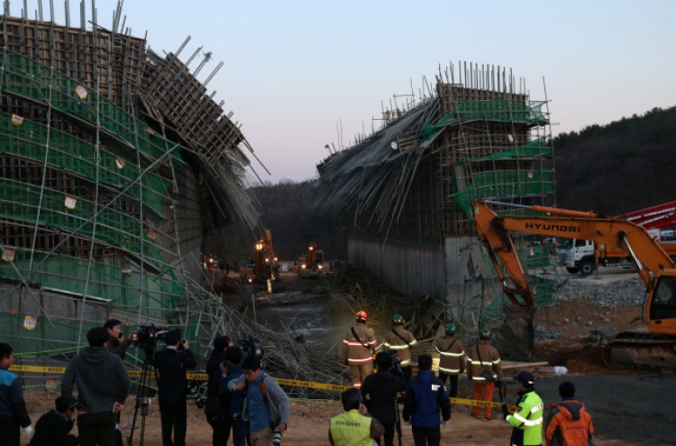 One dead, eight injured in road construction site collapse