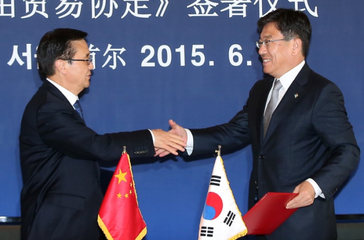 Korea, China sign free trade agreement