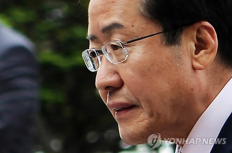 Governor denies bribery charges in Sung scandal