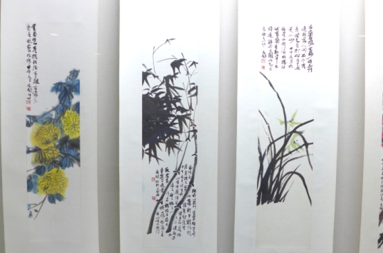 Chinese watercolor exhibition, lessons available at cultural center