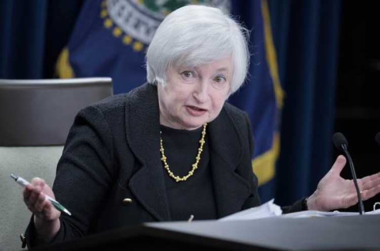 Federal Reserve holds rate at zero; cites China worries