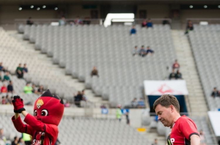 McDonald's opens soccer match