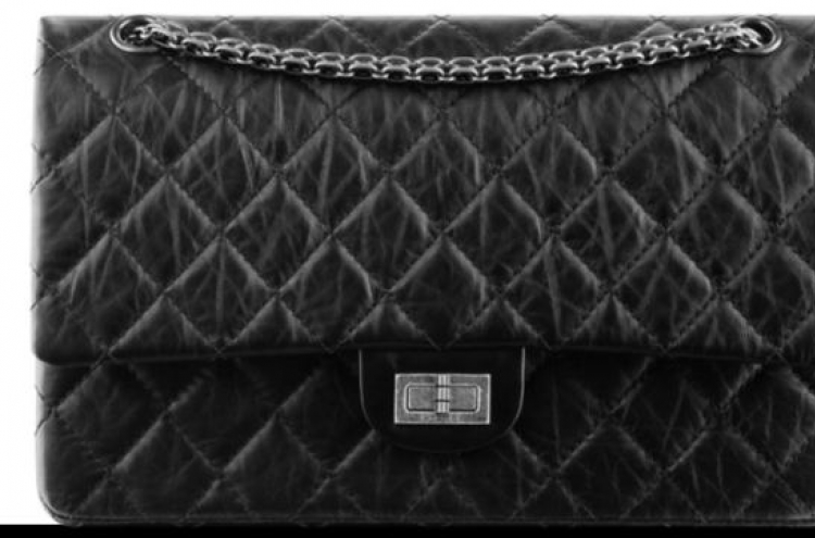 Chanel pushes handbag prices hike