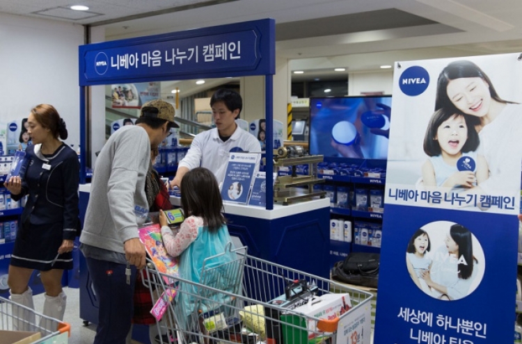 Nivea holds tin can cream photo engraving events