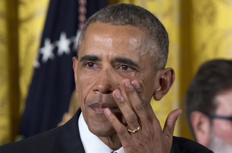 Tearful Obama pleads for 'urgency' on gun control