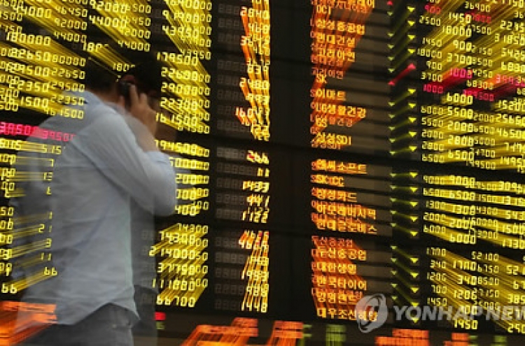 Seoul shares open lower