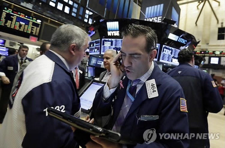 Seoul shares open higher on New York gains