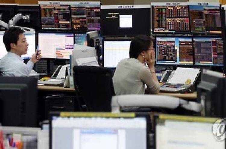 Korean shares close flat as Fed nods to heightened risks