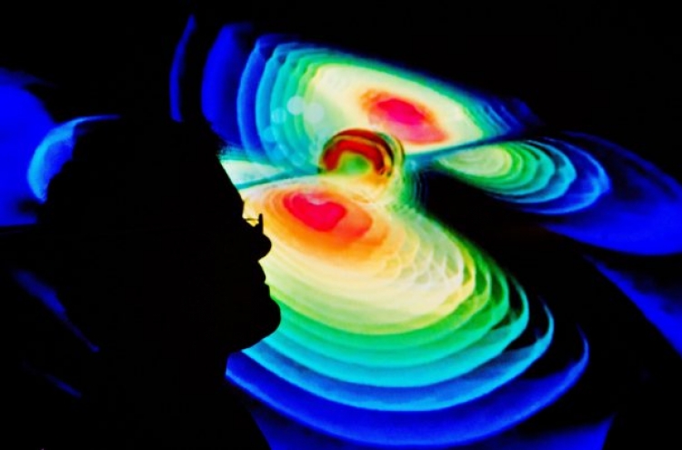 Scientists glimpse Einstein's gravitational waves