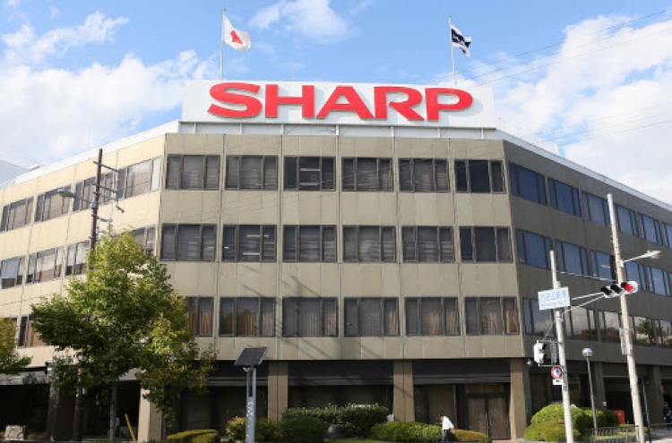 Sharp shares plunge as takeover thrown into question