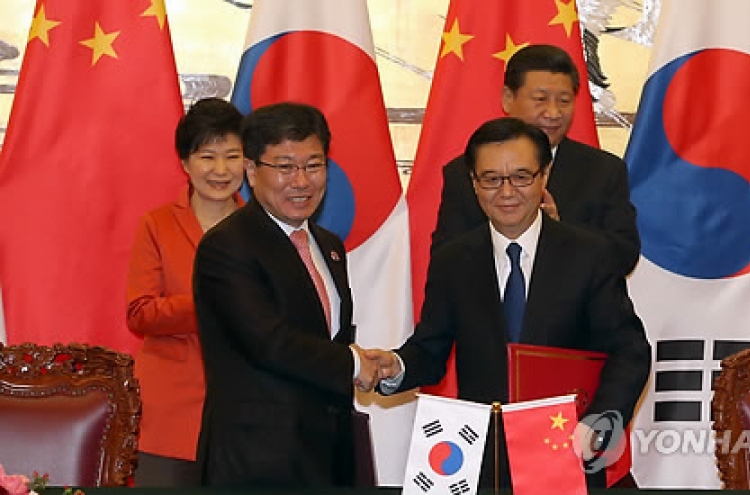 Seoul, Beijing start talks on removing non-tariff barriers