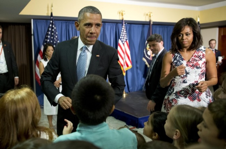 Obama arrives in Cuba for what he calls a "historic visit"