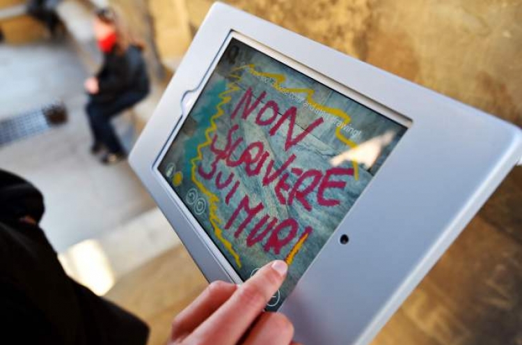 Itching to graffiti? Do it digitally on Florence treasures