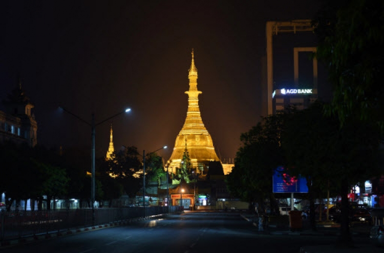 Myanmar pagoda re-clad with gold blocks as devotees look to gain spiritual credit