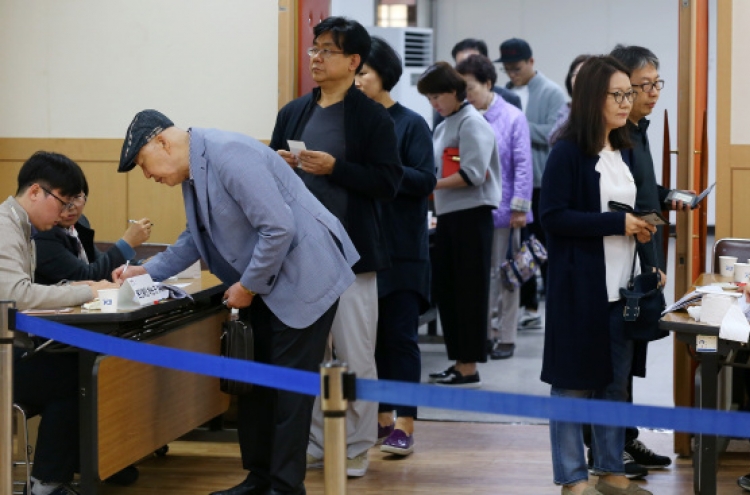 Voters go to polls with hopes of improved politics