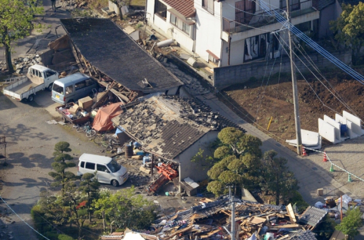 Strong quake in southwestern Japan kills nine, topples homes