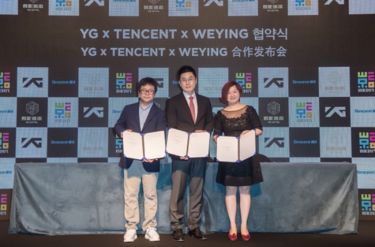 YG inks deals with Chinese online giants