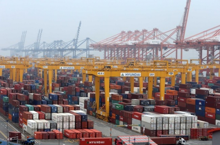 S.Korea‘s economic output edged up 0.7 % in 2014