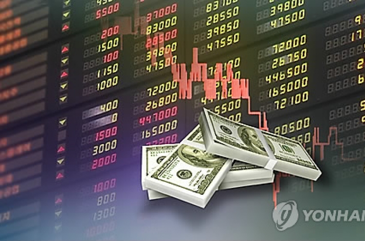 Korean shares down in late morning trade