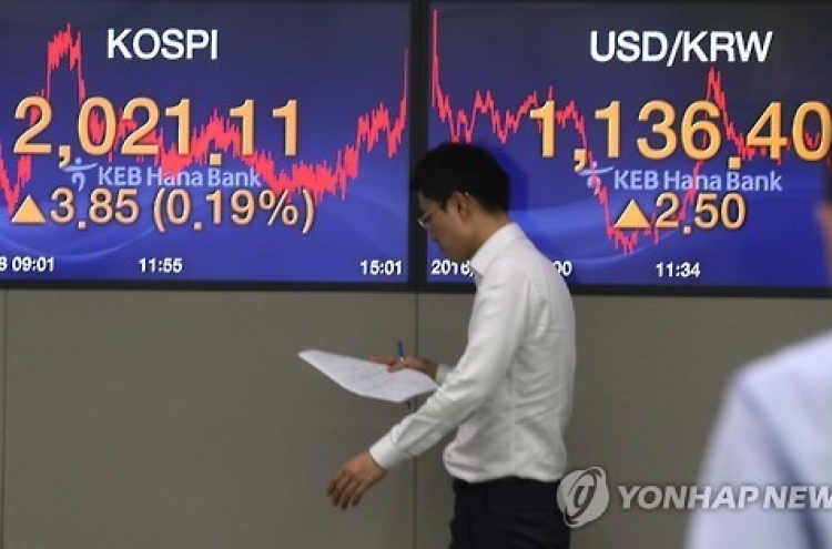 Korean shares down in late morning trading