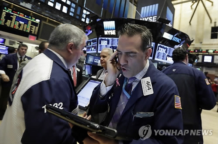 Seoul shares open higher on Wall Street gains