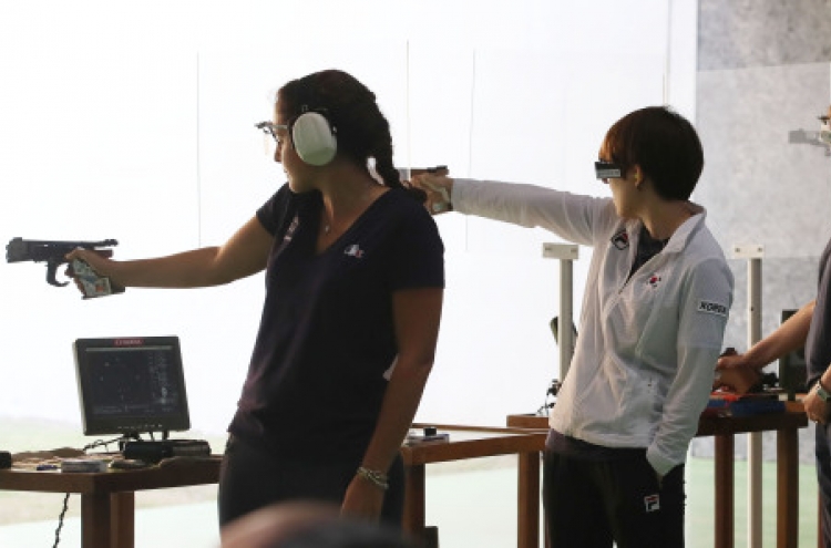 Reigning gold medalist fails to reach pistol shooting final