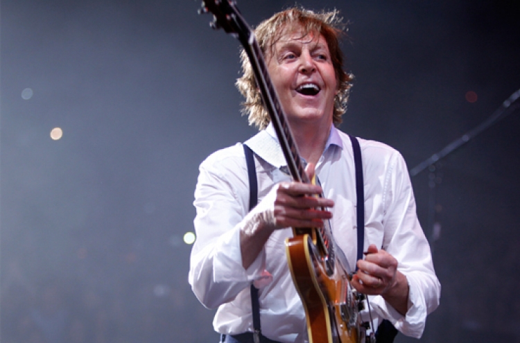 McCartney working on new album, signs with Capitol