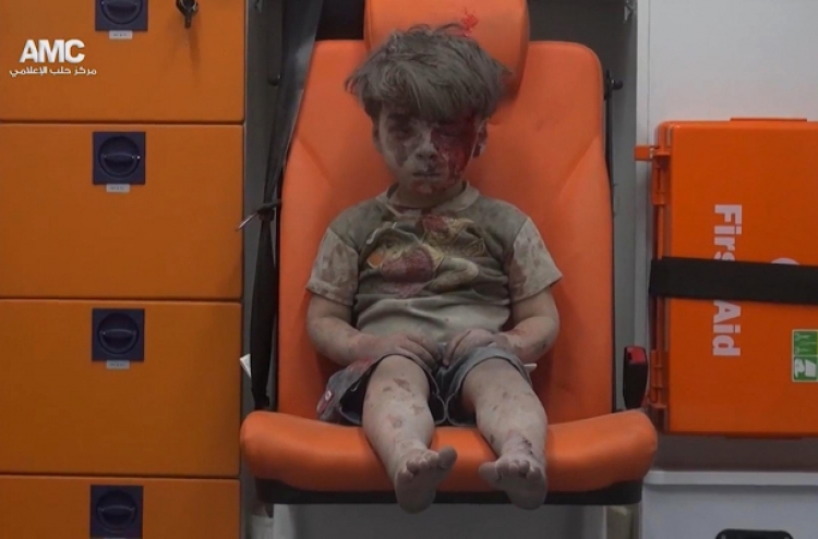 [Newsmaker] Omran, one child of millions scarred by Syria war