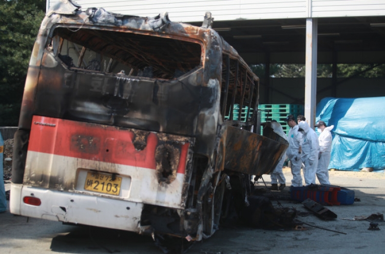 Careless driving blamed in bus fire that killed 10