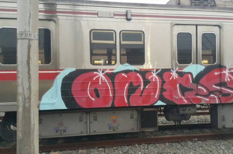 Russian men arrested for graffiti in Daegu