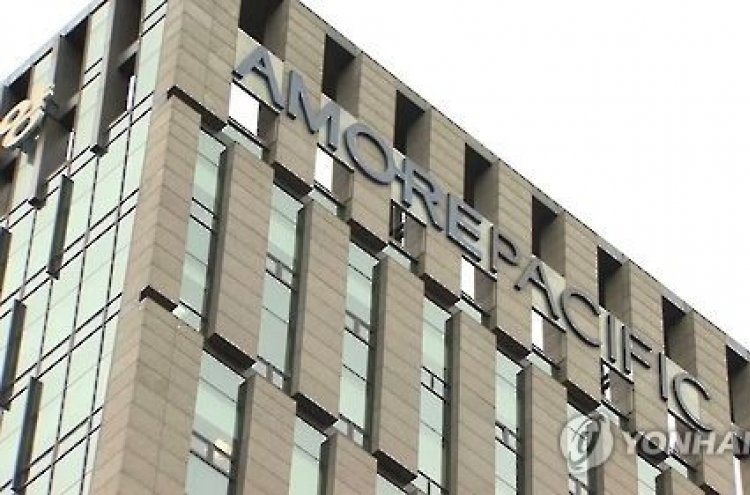 AmorePacific sinks on sales slump, THAAD woes