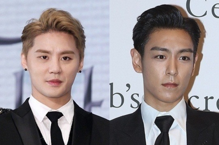 Big Bang's T.O.P, JYJ's Kim Jun-su enlist in military