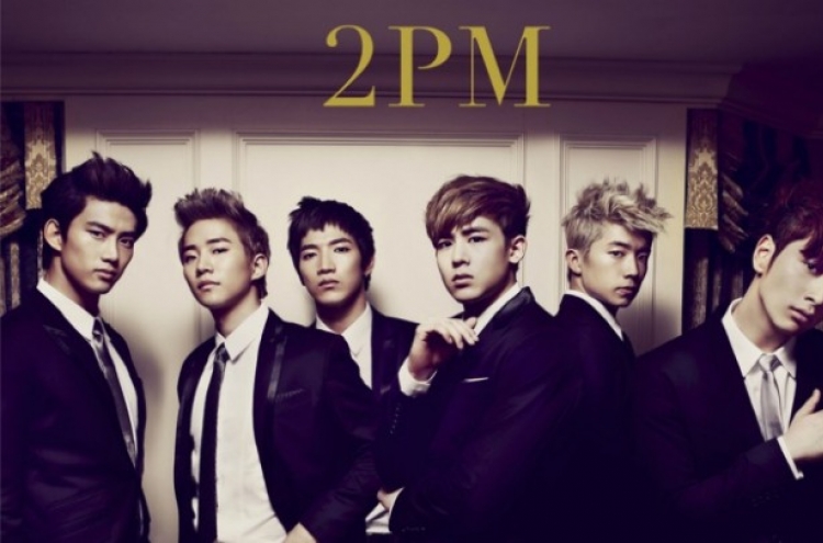 2PM cancels concert following member's stage injury