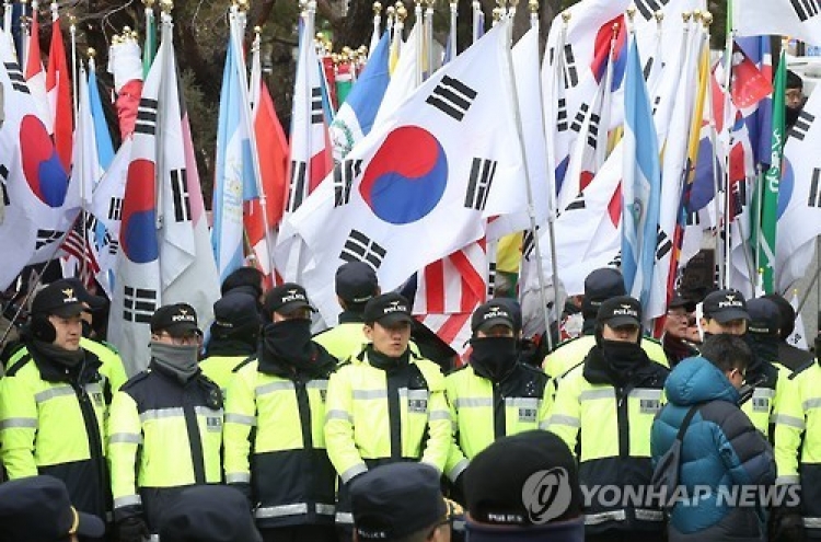 Park's supporters rally outside court as impeachment ruling nears