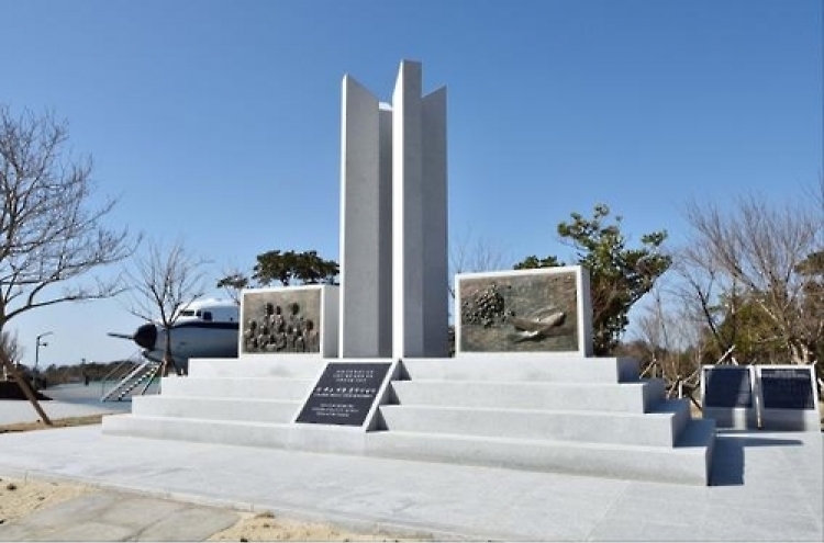 US airman honored by monument for rescuing war orphans