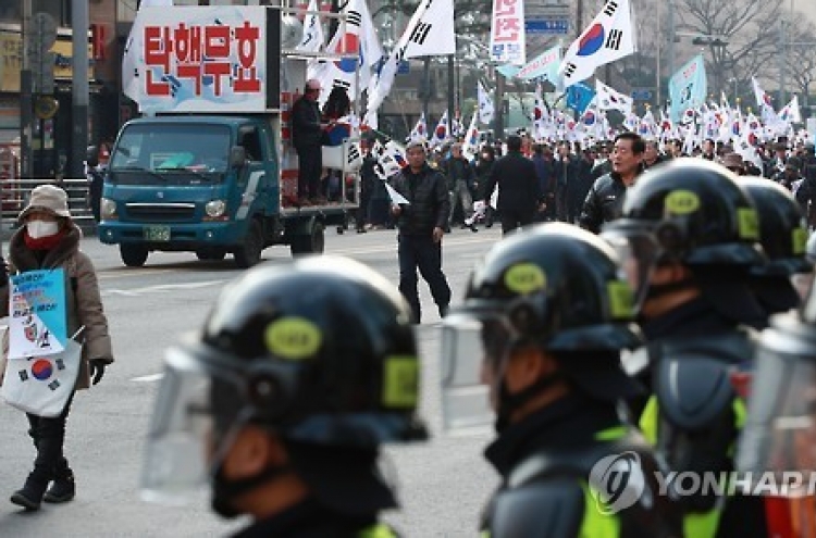 16 under police probe for violent rallies after Park's ouster