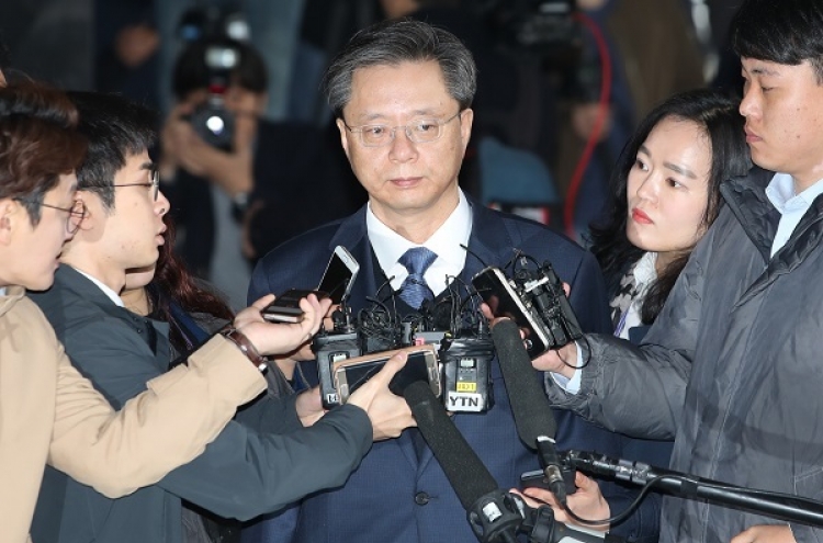 Woo questioned over corruption scandal