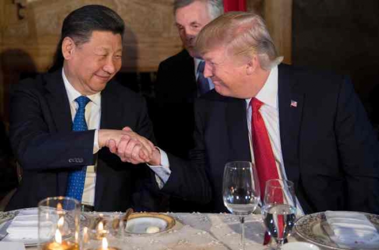 Trump kicks off meetings with Xi Jinping