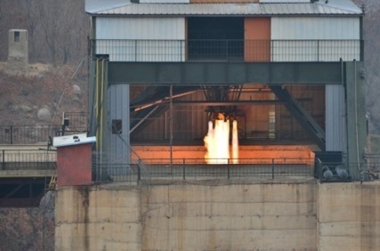 Rocket engine test puts NK closer to launching ICBM, satellite: report