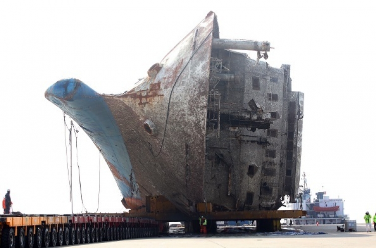 Sewol ferry moved on land, search for missing victims begins