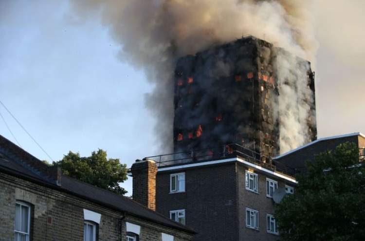 Death toll rises to 12 in London apartment building inferno