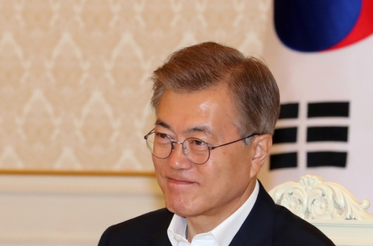 Record high popularity boosts Moon, feeds ire of opposition