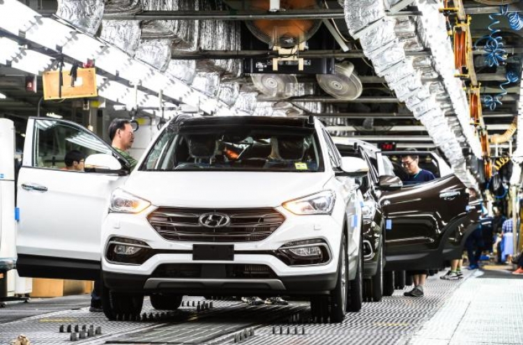 Labor costs at carmakers among highest last year