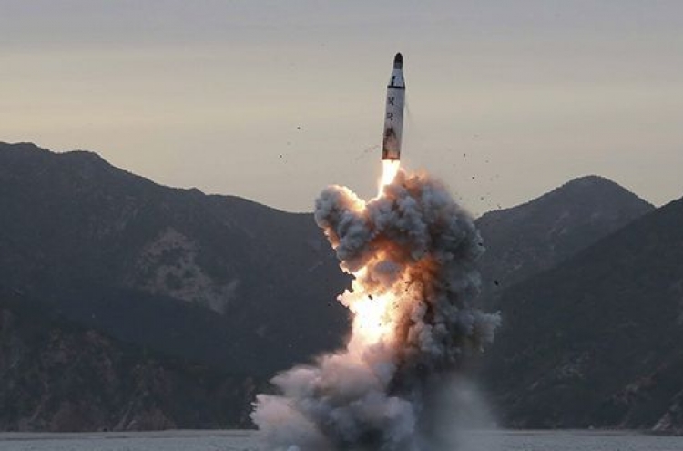 N. Korea fires projectile over Japan in aggressive test