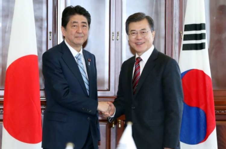 Moon, Abe denounce N. Korean nuke test, vow join efforts