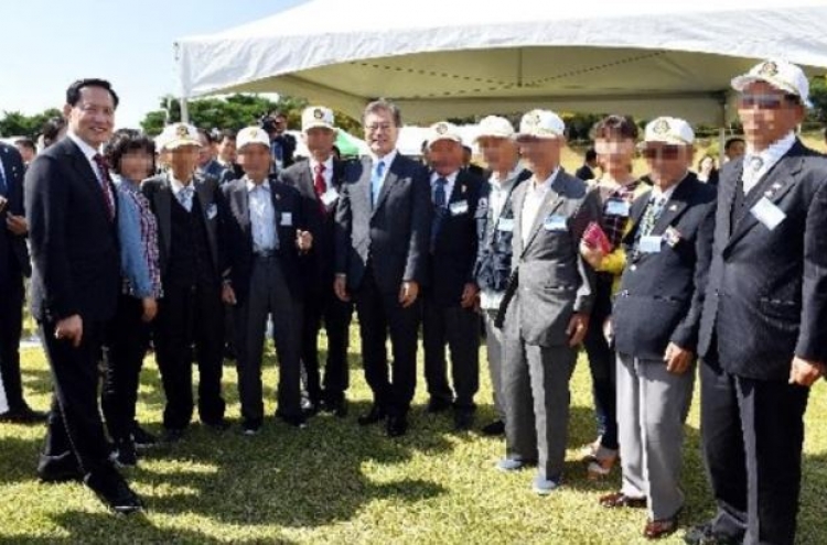 Korean president meets former POWs marking Armed Forces Day