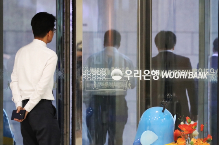 Woori Bank taps global biz group head as acting CEO