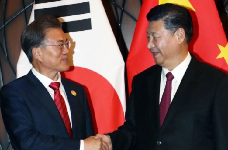 Moon due in China for summit with Xi over N. Korea, bilateral ties