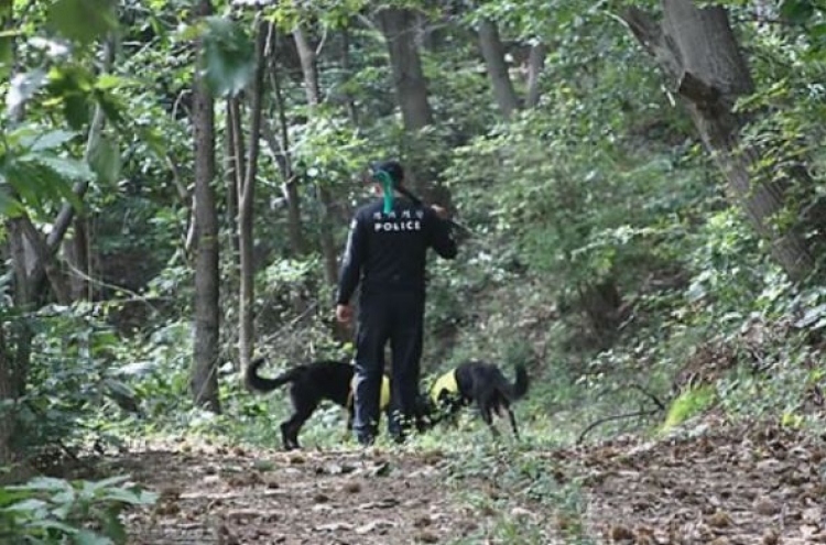 Police to investigate body found in woods